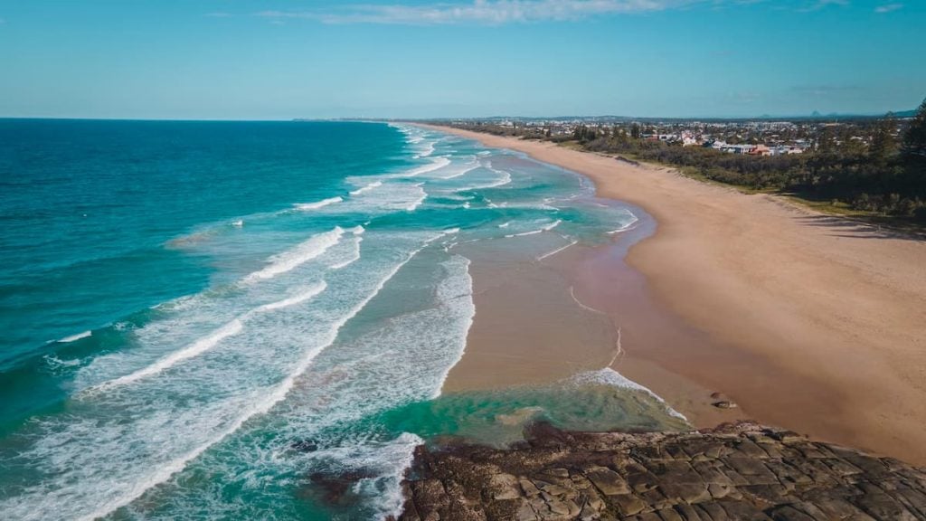 Sunshine Coast beach pictured in winter, photographed from the north end - a great stop along the Brisbane to Rockhampton drive.