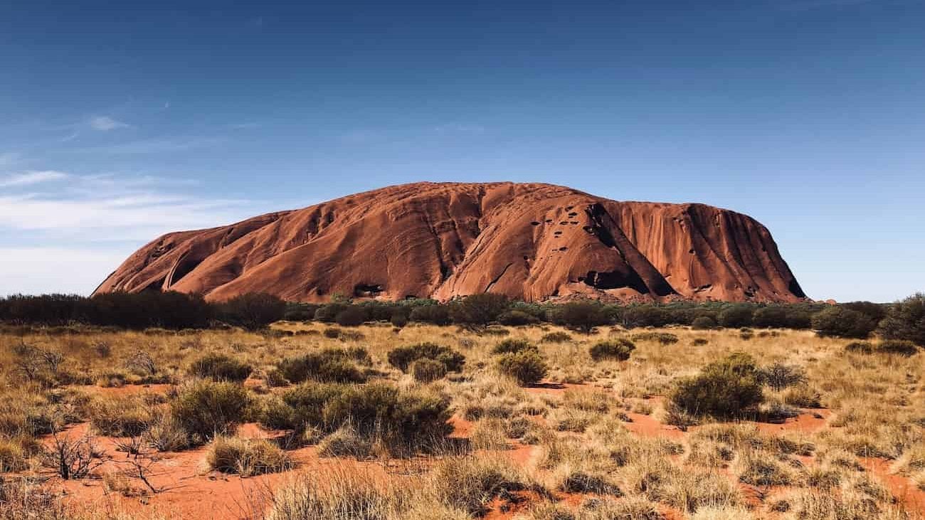 Make sure to stop by Uluru, the world famous sacred rock in the heart of the Australian desert, while on your Adelaide to Darwin road trip