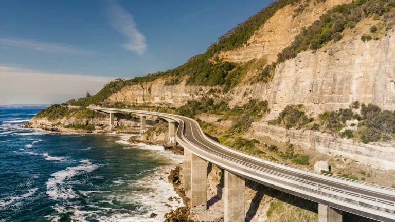 Drive along the breathtaking Sea Cliff Bridge on your next Sydney to Canberra road trip