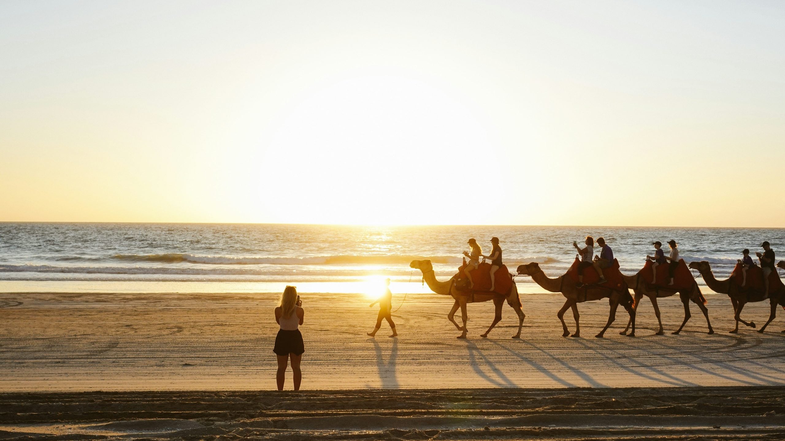Don't miss the opportunity for a camel ride along the beach on your Perth to Darwin road trip