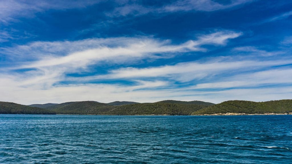 Carnarvon Bay is a sight to behold on a road trip from Hobart to Port Arthur