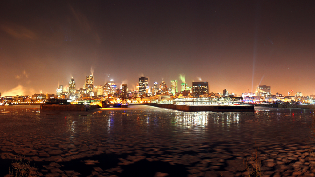 Top 5 things to do in Montreal during winter: Skyline from the Saint Lawrence River during Montréal en Lumière, Montreal, QC.