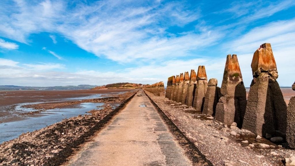 Causeway to Cramond Island in Edinburgh, Scotland, emerged at low tide