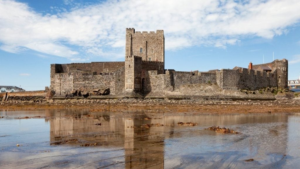 800-year-old Carrickfergus Castle with thick stone walls and waterfront views on Belfast Lough, County Antrim, Northern Ireland