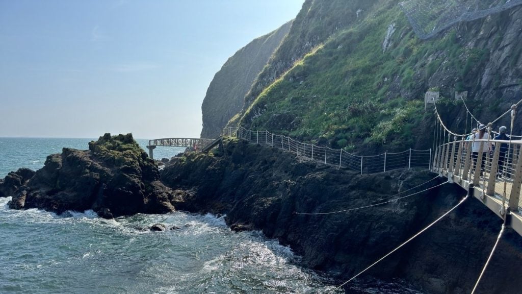 Gobbins Cliff Path walkway built into basalt cliffs with tunnels and steel bridges above the sea, County Antrim, Northern Ireland