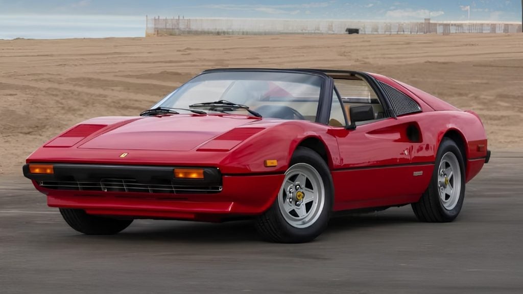 Red 1982 Ferrari 308 GTS with targa top, front three-quarter view, available to rent in Los Angeles
