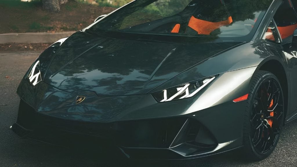 Lamborghini Huracán EVO front exterior with Y-shaped headlights and sharp aerodynamic lines.